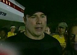travolta-flies-to-haiti.jpg