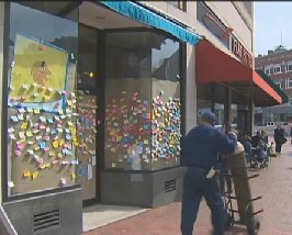 Sticky Notes on storefront - CBS video snapshot