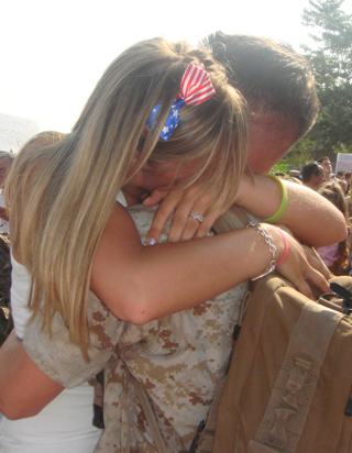 Soldier welcomed home by daughter - family photo by Brittany Rood