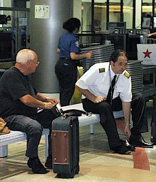 TSA screening, photo by SS&SS via Flickr-CC