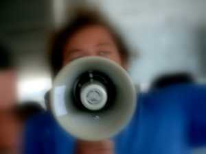 protestor-woman-megaphone-by-xenia-morguefile