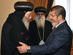 Egyptian Islamist president welcomes Coptic leader -govt photo release