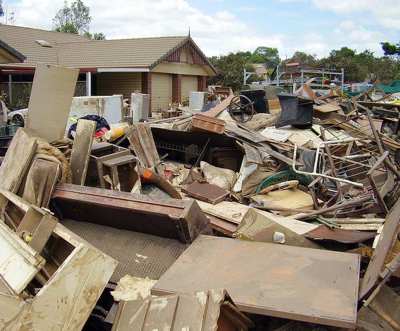 debris from disaster piled in neighborhood-photo by davidbuschaus