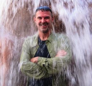 Darin  Hollingsworth under waterfall