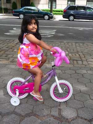 biking little girl in NYC