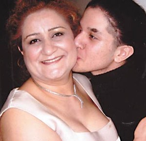 Fatemah Golmakani with son- family photo