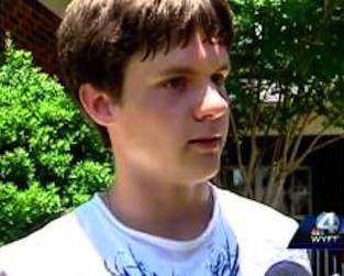 boy stops burying dog to save another