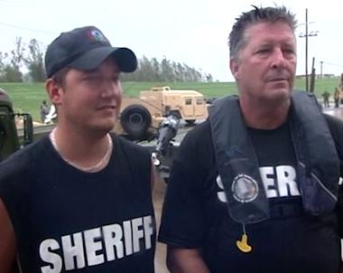 father-son team rescues 60 from flooding