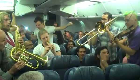 Lemon Bucket Orkestra plays on airliner