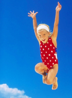 girl jumps for joy - Photo by Sun Star