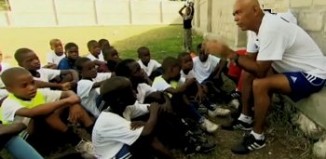 CNN Hero with kids he mentors through soccer