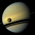 Saturn and its moon-NASA-Cassini