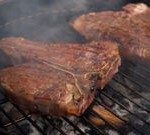 steaks on grill