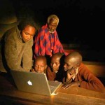 Masai students work at night, after herding during the day