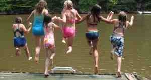 girls-jumping-lake.jpg