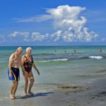 Beach walking elderly couple-Don Johnson 395-cc-Flickr
