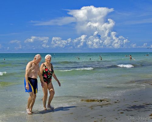 Beach walking elderly couple-Don Johnson 395-cc-Flickr