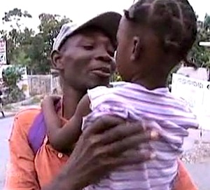 haiti-dad-kid-reunited.jpg