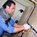 Afghan learns electrical trade, US military photo