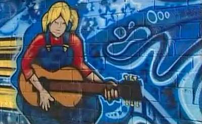 guitar-playing mural