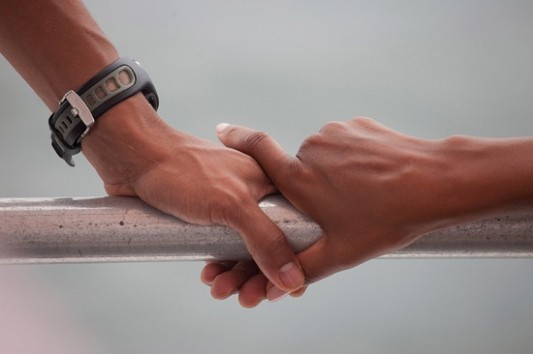 President Barack Obama and First Lady Michelle Obama’s hands rest on the railing of a boat during their tour of St. Andrews Bay in Panama City Beach, Florida, after the Gulf oil spill, Sunday, Aug. 15, 2010. (Official White House Photo by Pete Souza)