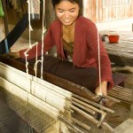Cambodian crafts people produce silk items once again