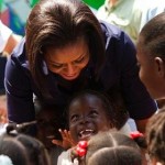 Michelle Obama with child in Haiti - WH Photo