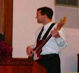 family photo of bass playing son