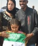 Mo Farah w family and flag - Photo by Somaliland Press