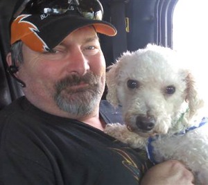Trucker with dog - photo from Operation Roger