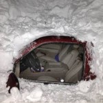 snow entombed car New Mexico
