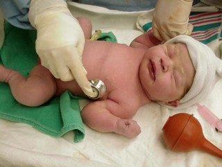 Baby examined at birth by Anita Patterson-Morguefile
