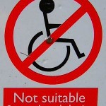 Wheelchair inaccessible sign - by Godric Godricson via Morguefile