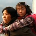 Chinese grandmother carries girl to school every day in China