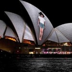 Sydney Opera House with a projected woman on front
