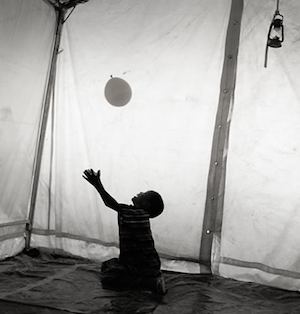 African Boy with balloon -Save the Children photo