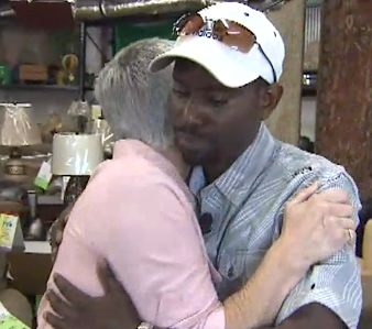 Embrace woman buys furniture for stranger
