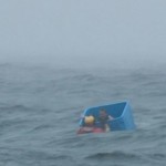 Ocean survivor floats in crate-Joel Brady-Power