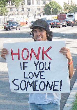 Sign "Honk if you love someone" - Photo by IvanPriceDesign