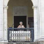 Cuba balcony woman UNPhoto-Milton Grant