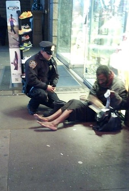 Cop and homeless shoeless man-JenniferFoster