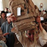 Afghan kids get backpack donations -NATO photo