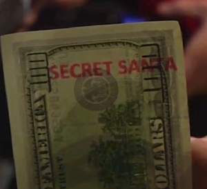 100 Dollar bill w/ Secret Santa stamp