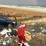 Santa on storm-ravaged beach with rainbow - AP video snippet