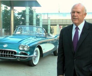 CEO of GM with his Corvette
