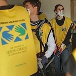 Cleanup crew in yellow vests-Mormon Helping Hands