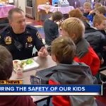 deputy sits at school lunchtable - ABC Video