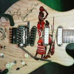 guitar w/ Massai design was returned to Jennifer Batten