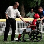 Jim Abbott greets wheelchair athletics fan
