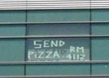 Pizza plea on window